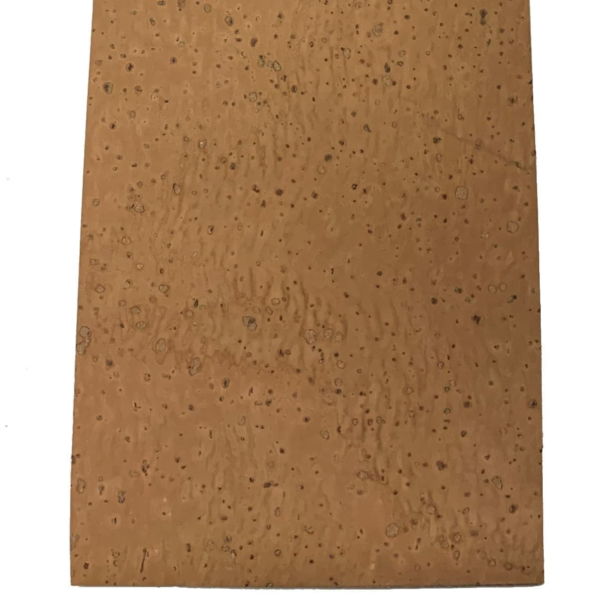 A close-up of top quality, all natural solid cork sheet for musical instruments.
