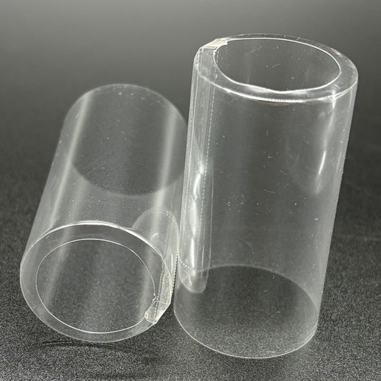 Two open cap PVC shrink caps with vertical perforations