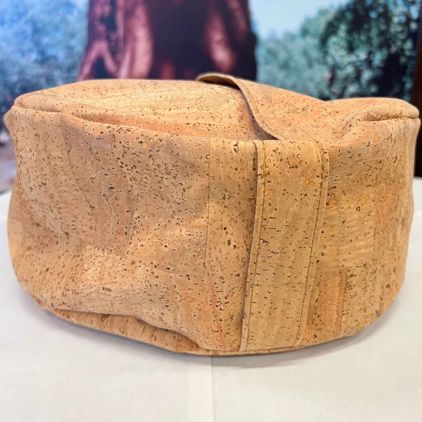 Full view of round yoga cushion made with Harmony cork fabric with built in carry handle