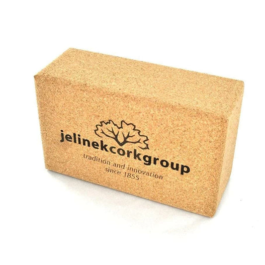 Cork yoga block with Jelinek Cork Group branding on a white background