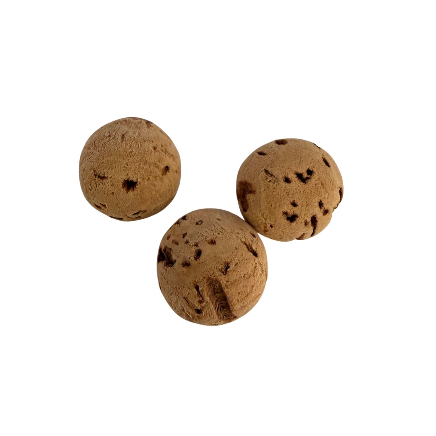 Three solid natural cork balls with a 12.7mm diameter