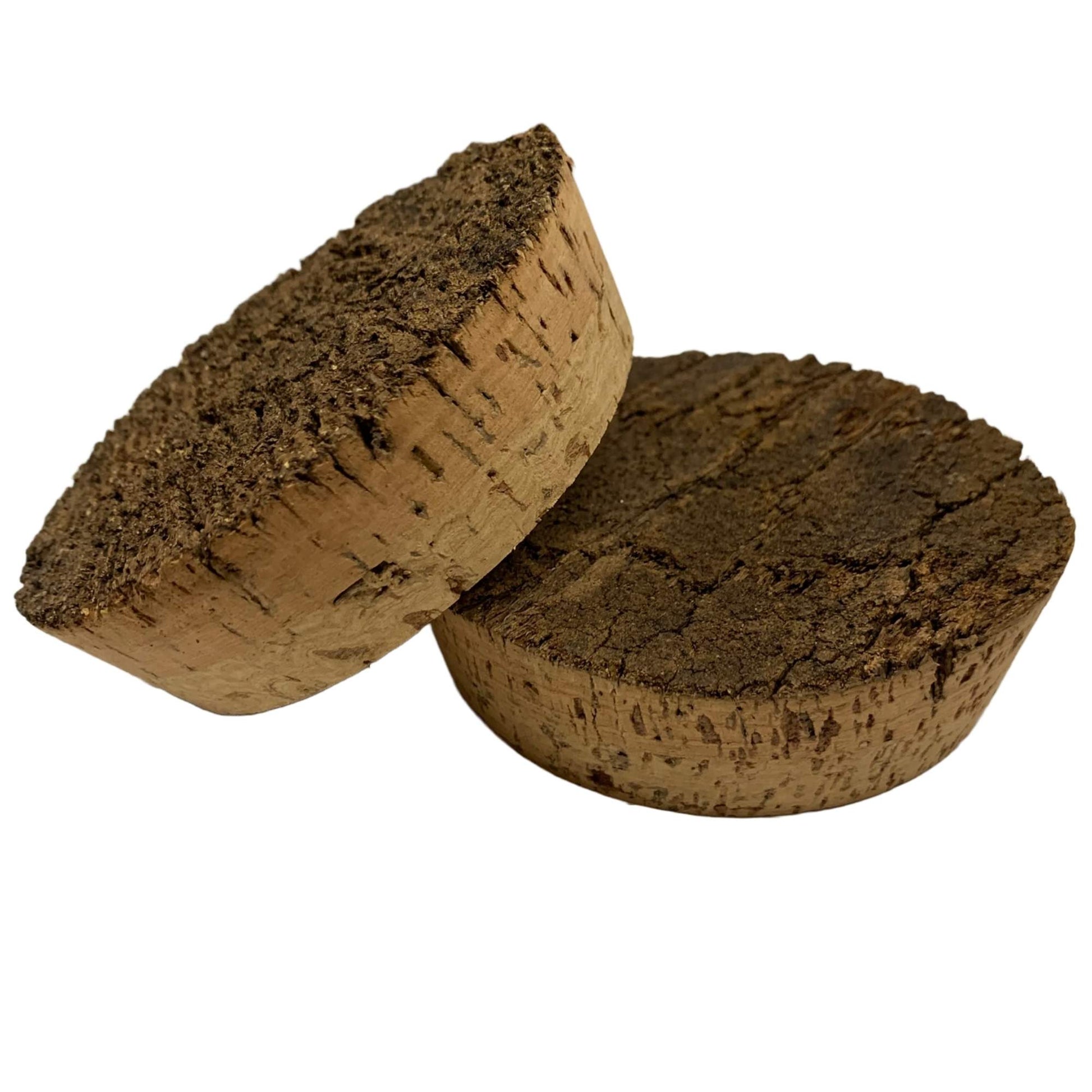 Solid cork BT08 stoppers with rough natural tops, ideal for pottery and ceramic closures.