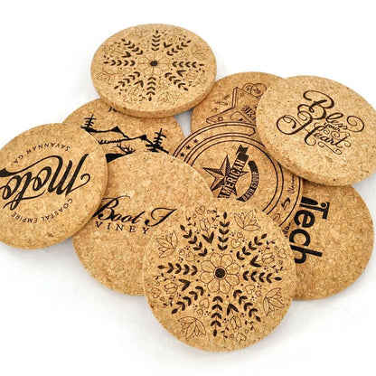 Set of round cork coasters with various designs and text to show custom printing