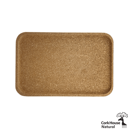 Rectangular cork serving tray with curved edges and a raised lip. View from overhead
