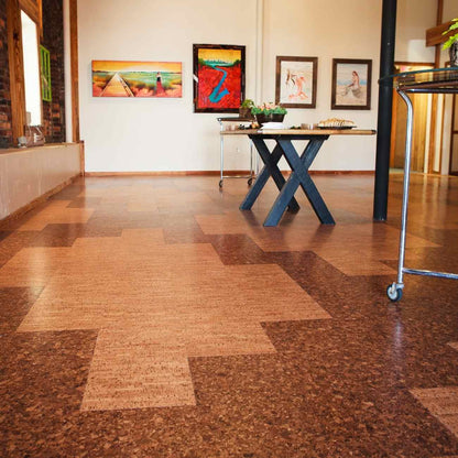 Cork floor with a geometric pattern in a room with artwork on the wall. Casablanca cork flooring is a light tan shade with natural striations 