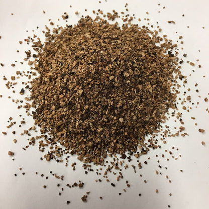 A pile of granulated cork size of 1-2mm shows the grain size, texture and color.