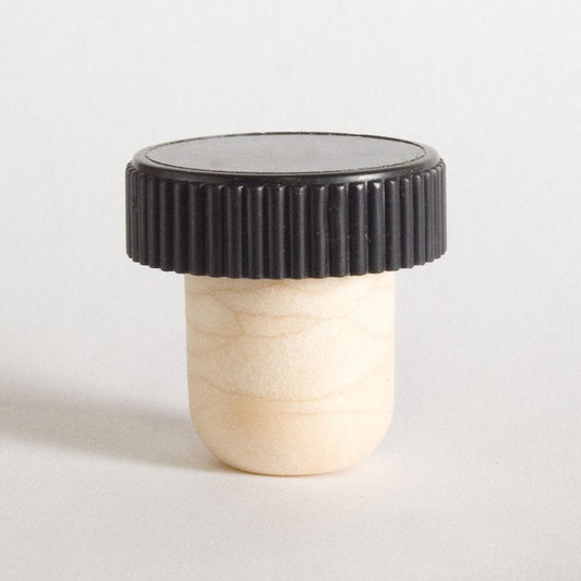 Black plastic ribbed capped stopper with a synthetic cork stem