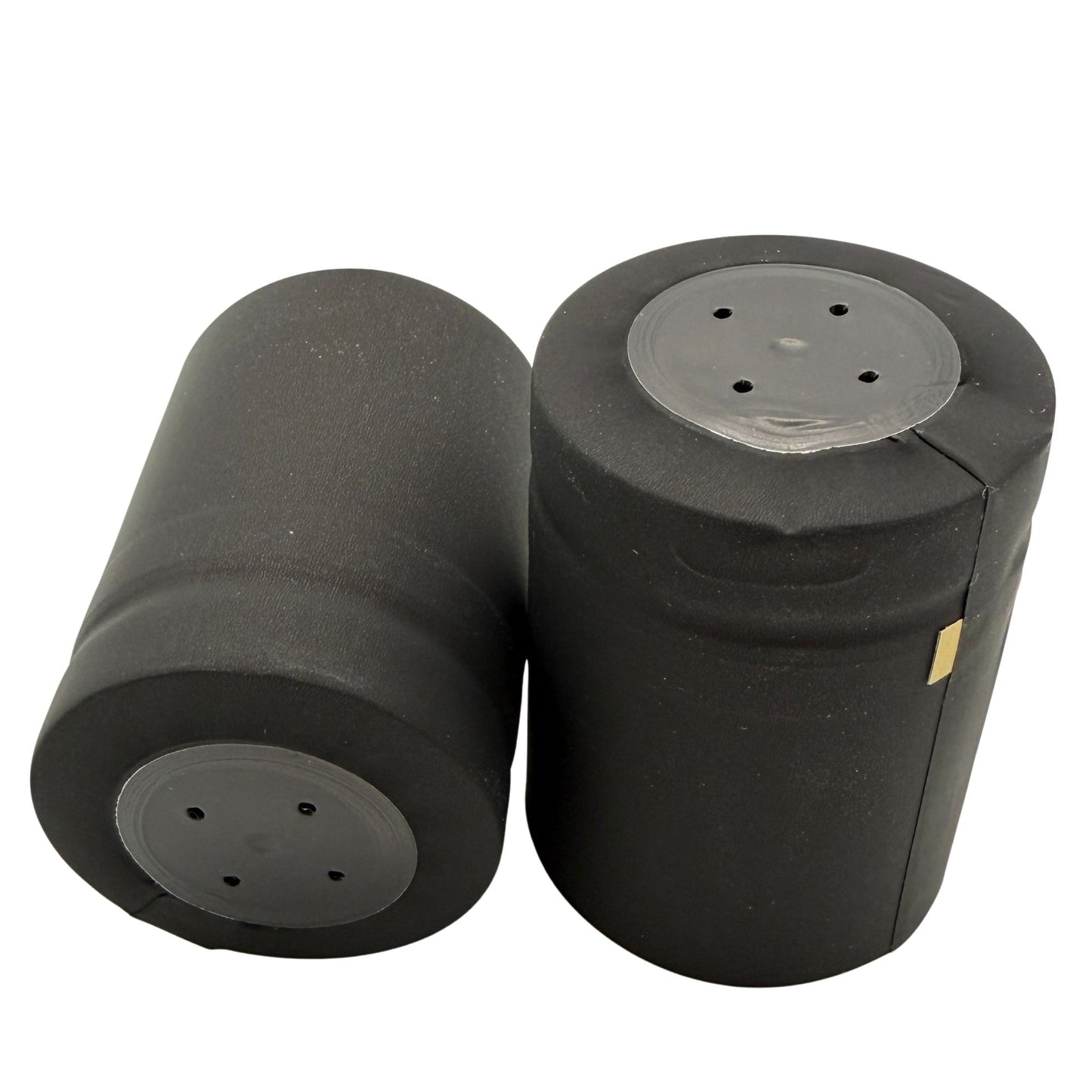 Matte black shrink caps with gold horizontal tear tab and closed cap close-up.