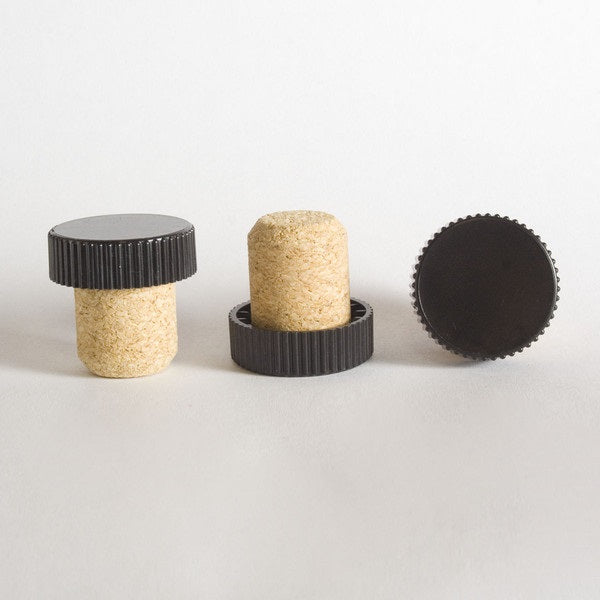FusionCork stoppers with black ribbed plastic caps for liquor bottles