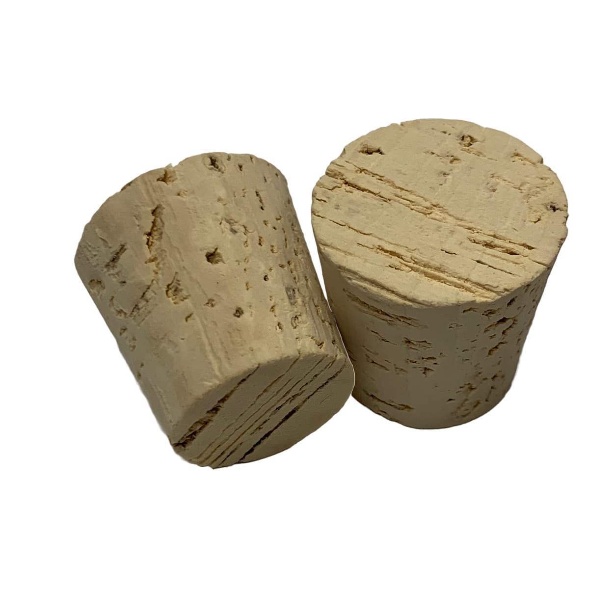 Two natural cork stoppers which show the variation and natural texture of natural cork.