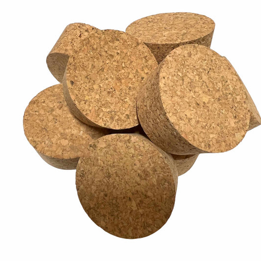 Various angled views of short-length tapered cork stoppers showing texture, size SL28