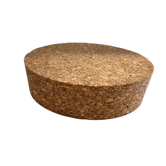 Closeup of single agglomerate tapered cork stopper showing short length, size SL58