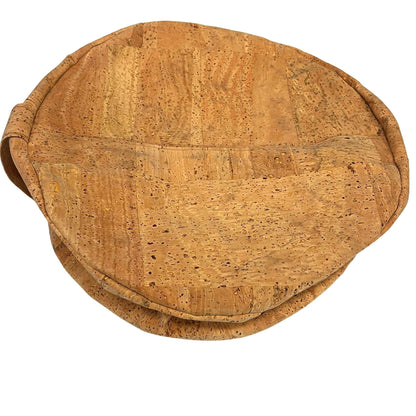 Round cork yoga pillow folded down made with Harmony cork upholstery fabric.