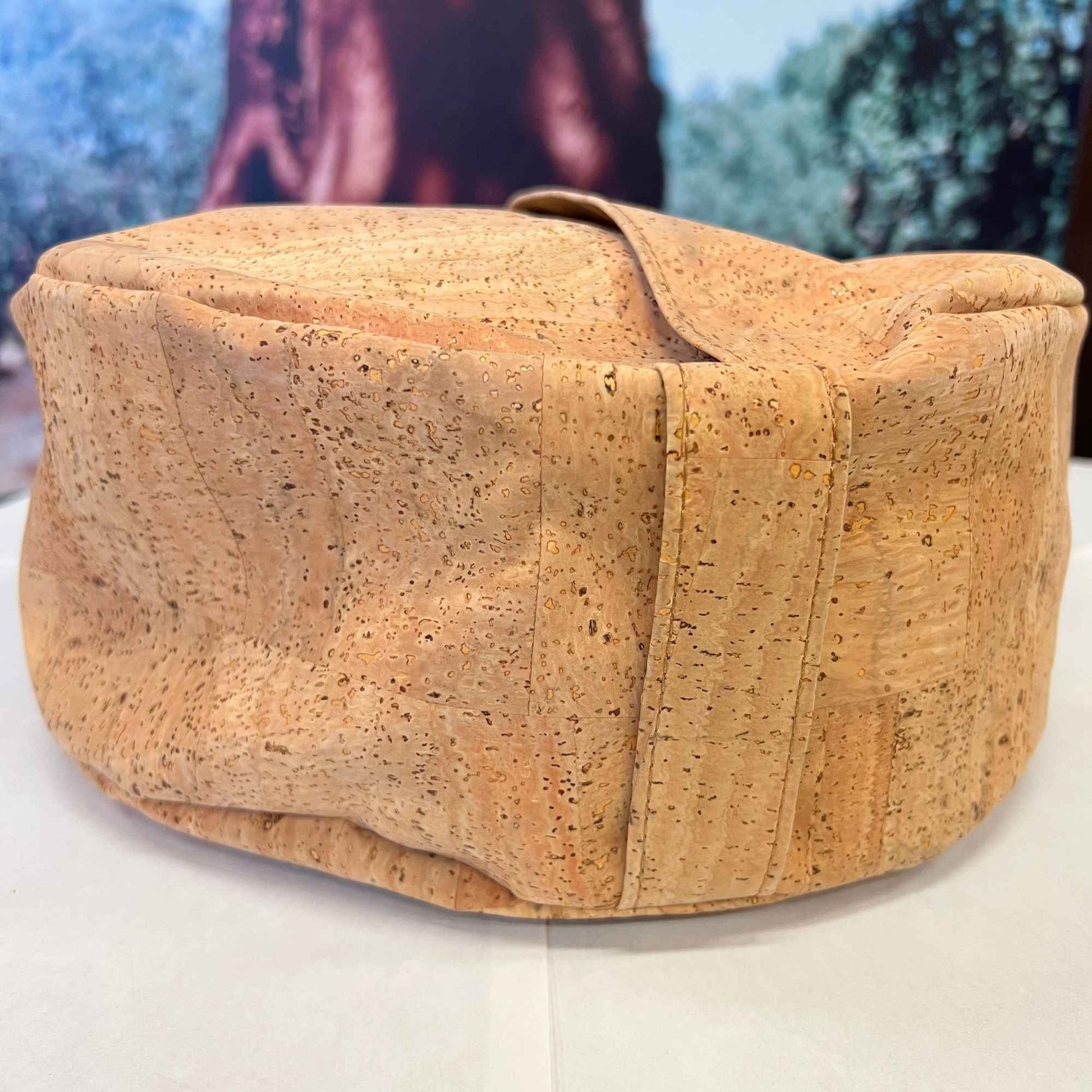 Full view of round yoga cushion made with Harmony cork fabric with built in carry handle