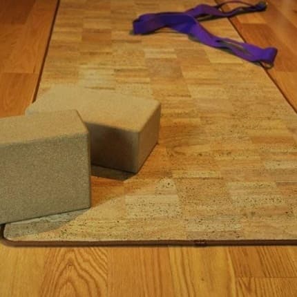 Two cork yoga blocks on a cork yoga mat.