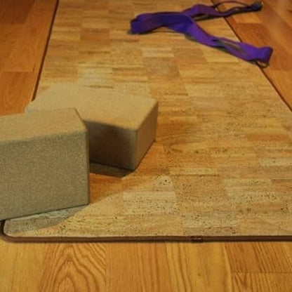 Two cork yoga blocks on a cork yoga mat.
