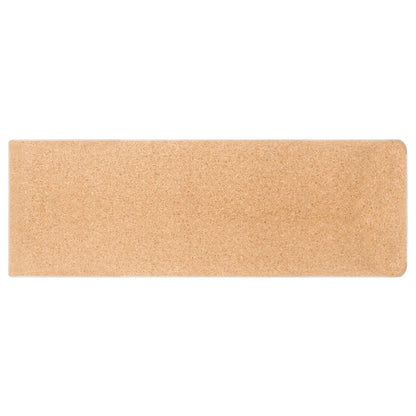 Unrolled cork yoga mat.